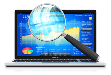 Laptop or notebook and magnifying glass