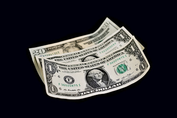 American dollar stock images. Paper banknotes on a black background. US paper bills. American banknote images