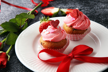 Delicious cupcake for Valentine Day. cake for Valentines day with chocolate and strawberries. Traditional homemade with red roses