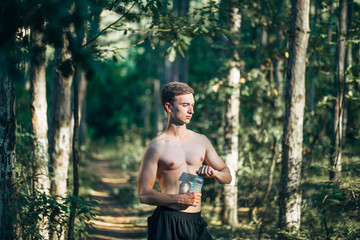Fit Young Man In the Forest