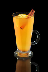Cup of lemon tea with cinnamon stick isolated on black