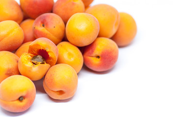delicious ripe apricots on white with copy space