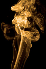 Obraz premium Smoke rising against black background