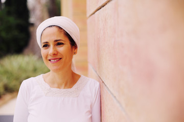 Outdoor portrait of 40 years old woman