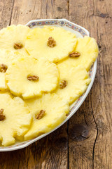 Pineapple slices in a dish