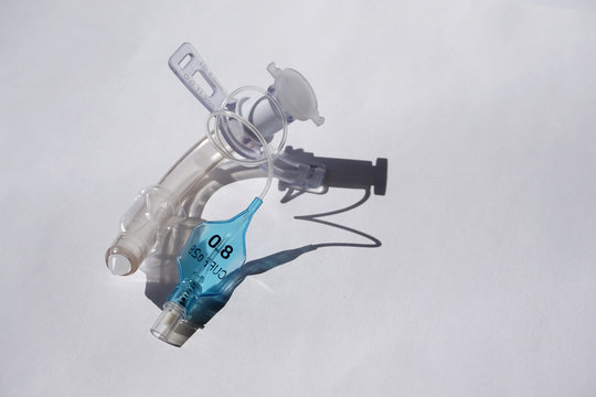 tracheostomy tube on a white background