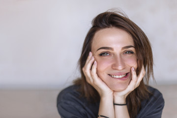 Close-up portrait of beautiful, fresh, healthy and sensual girl. Portrait of smiling girl