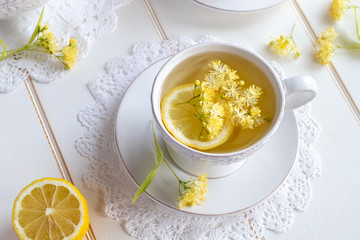 A cup of herbal tea with linden flowers