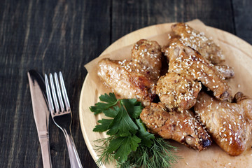 Chicken wings on a serving board