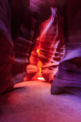 Beautiful wide angle view of amazing sandstone formations in famous Antelope Canyon on a sunny day with blue sky near the old town of Page at Lake Powell, American Southwest, Arizona, USA