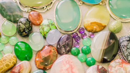 assorted colorful gemstone cabochon. geology and mineral background