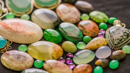assorted colorful gemstone cabochon. geology and mineral background