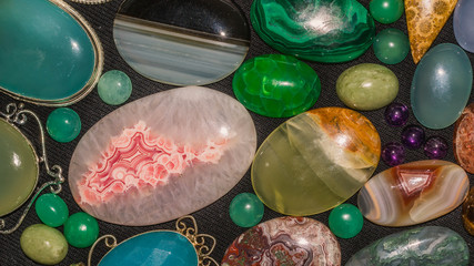 assorted colorful gemstone cabochon. geology and mineral background