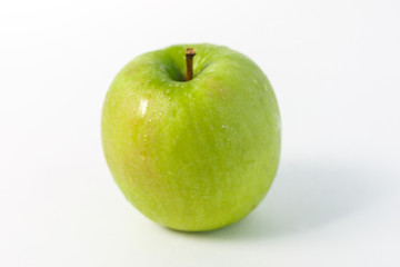 ideal food for healthy eating and diets: green Apple on white background