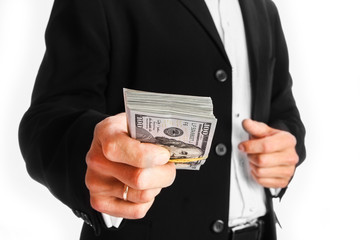 Business man holding money on white background