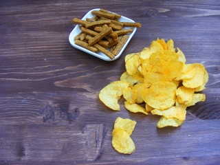 Crispy potato chips and dry bread