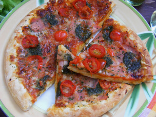 Fresh tasty pizza close up slices flat view