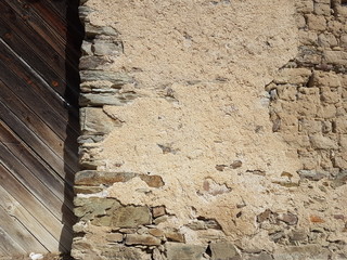 Wooden door and mud bricks background