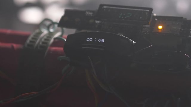 Bomb with a countdown clock bursting in smoke at the end.