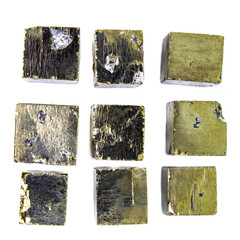 Small cubes of natural pyrite on a white background