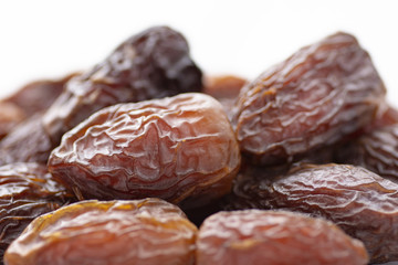 dried dates on a white background
