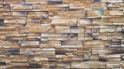 Beautiful Tan / Brown Shade Natural Stone Brick Wall Texture for Background, Backdrop, or Wallpaper.