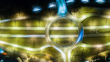 Highway roundabout aerial at night