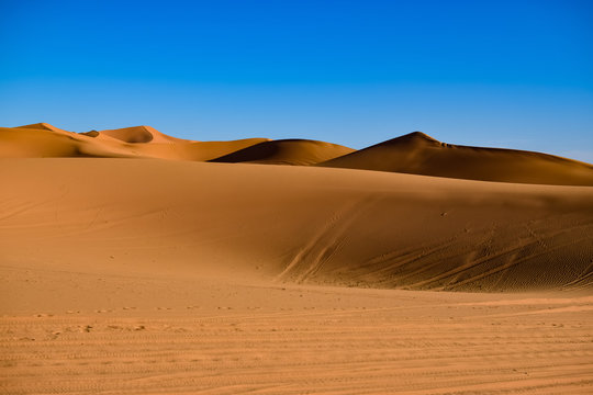 the loneliness of the desert in the afternoon. Photograph taken somewhere in the Sahara desert in Merzouga (Morocco)
