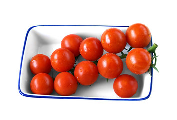 Clusters of fresh small tomatoes