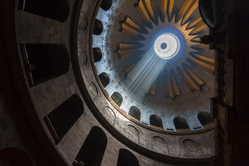 Jerusalem , Israel - March 11, 2018 : The Holy Sepulchre Church in the Old City of Jerusalem. Light goes through the dome of the church.