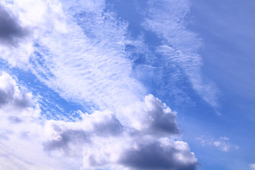 Beautiful blue sky and beautiful white cirrus and cumulus clouds. Landscape. Background.