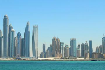 Obraz na płótnie Canvas View of Jumeirah beach from Palma. United Arab Emirates. Area Dubai Marina. Skyscrapers. Panorama. Background.