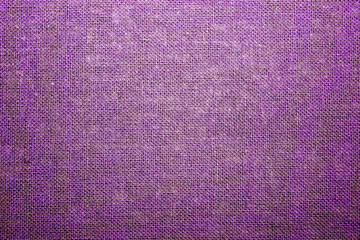 Rough canvas purple canvas. Texture of coarse cloth, burlap