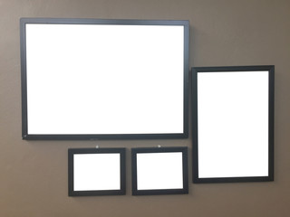 Empty photo frame on wall background, copy space.