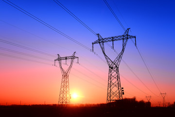 Fototapeta premium High piezoelectric towers, in the setting sun