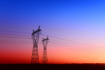 Fototapeta premium High piezoelectric towers, in the setting sun