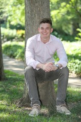 Young male college student, casual photo in park