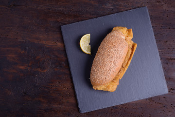 Sandwich with sicilia panelle on slate plate 