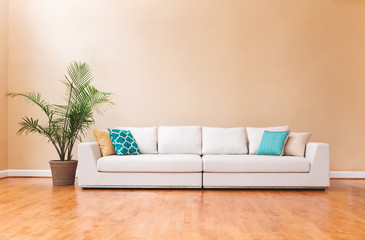 White couch in a large luxury interior home
