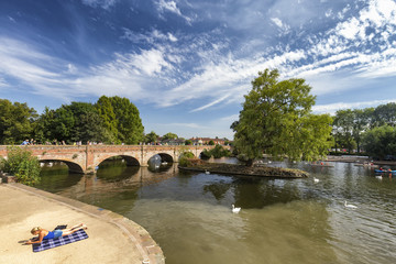 STRATFORD-UPON-AVON, UNITED KINGDOM - AUGUST 24: An unidentified woman relaxes at the River Avon in...