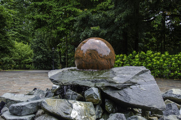 Solid Round rock on top of stones