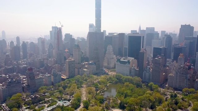 Aerial view of Central Park, New York, USA, Skyscrapers on background. Luxury residential buildings.