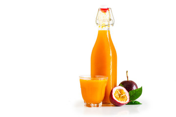 Passion fruit and passion fruit juice In a glass White isolated background 