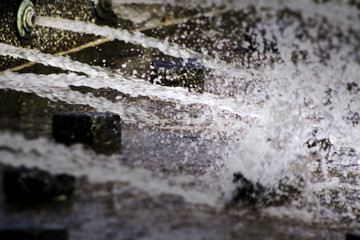 Fototapeta na wymiar Water from a park fountain on a crisp winter day in Seattle