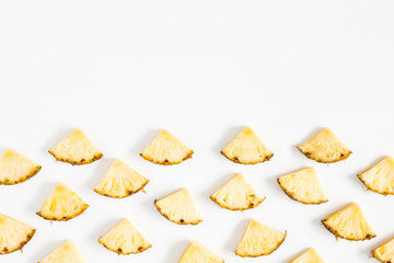 Pineapples on white background. Summer concept. Flat lay, top view, copy space