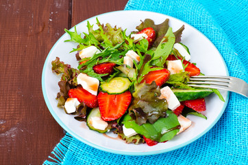 Summer vegetable salad with strawberries