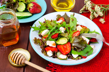 Summer vegetable salad with strawberries