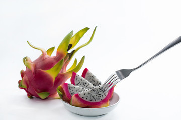 Healthy dragon fruits and a piece with fork