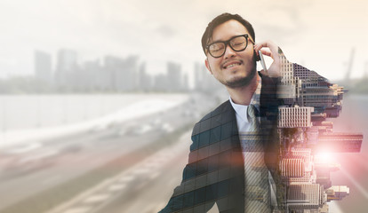 Double exposure businessman using mobile phone.
