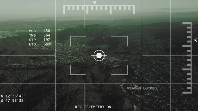 Long range weapon lock on night vision UAV / missle / Helicopter on town in the distance.